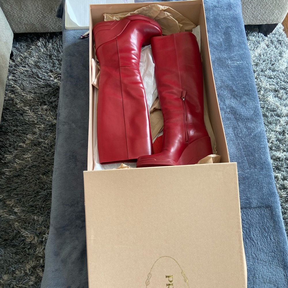 Red leather Prada knee boots with rubber platform souls original box